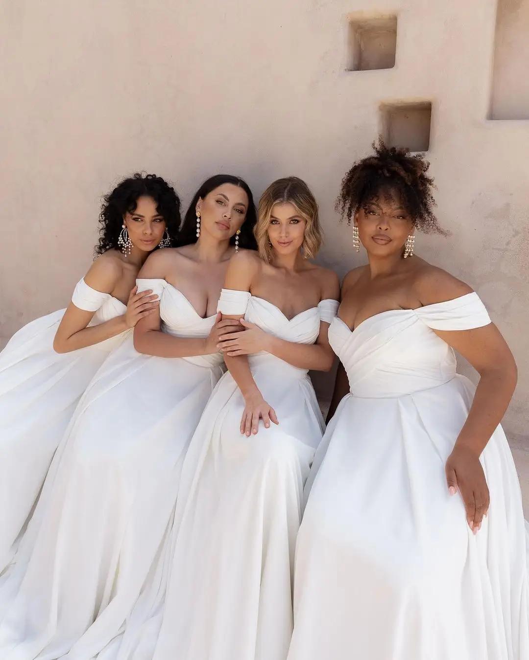 Models wearing different sizes of the same wedding dress